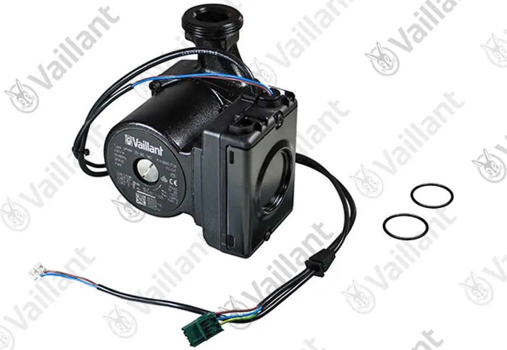 Vaillant Pumpe mit elektrischen Anschlüssen und zwei O-Ringen in der Nähe. Das Gerät hat ein kompaktes Design und dient zur Wasserzirkulation.